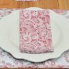Sweet Pea Linens - Brick Red Paisley Print Cloth Napkin (SKU#: R-1010-W4) - Table Setting