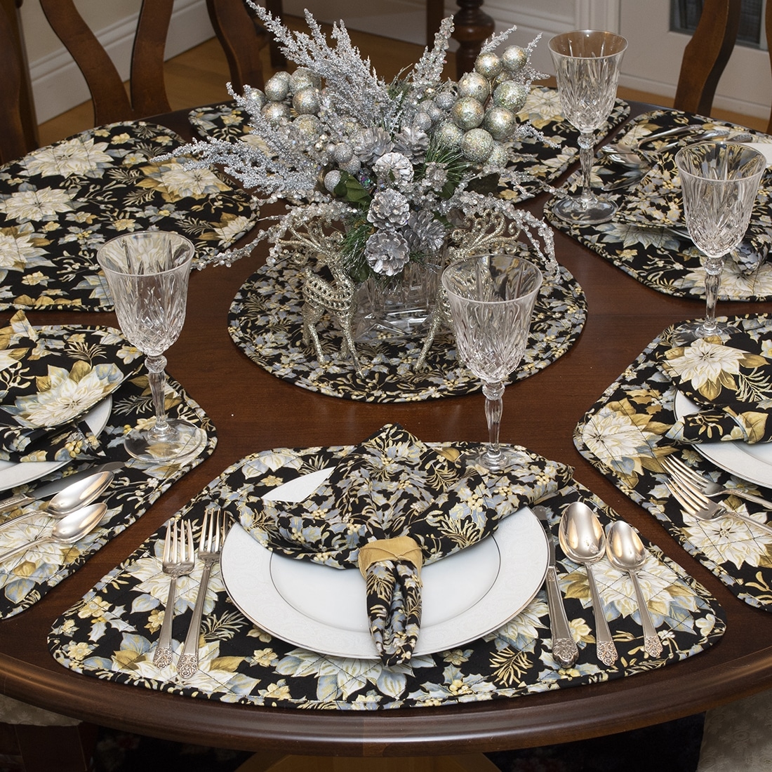 Sweet Pea Linens - Quilted Black, Silver & Gold Christmas Poinsettia Wedge-Shaped Placemats - Set of Four plus Center Round-Charger (SKU#: RS5-1006-X4) - Alternate Table Setting